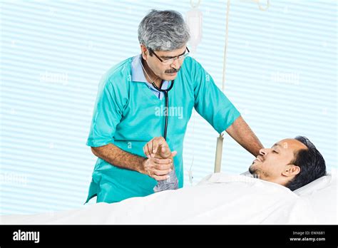 Indian Doctor Patient Checking Stock Photo Alamy