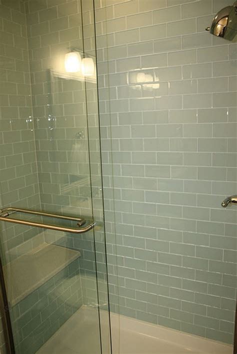 This remodel went from a tiny corner bathroom, to a charming full master bathroom with a large walk in closet. 37 green glass bathroom tile ideas and pictures