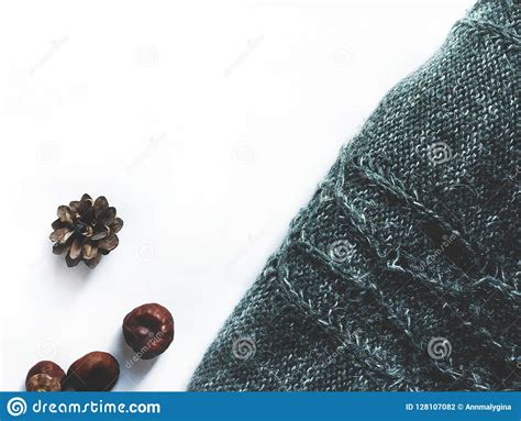 flat lay  white background pine cones knitted plaid sweater mockup stock photo image