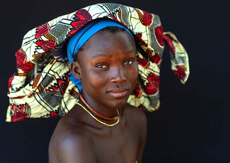 Portrait Of A Mucubal Tribe Women Wearing Colorful Headwears Namibe