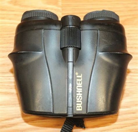 Genuine Bushnell 7 15x25 Zoom Fully Coated Optics Binoculars With Strap