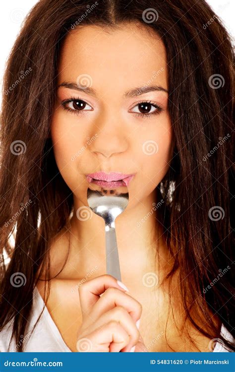 Smiling Woman With Spoon In Her Mouth Stock Photo Image Of Lick