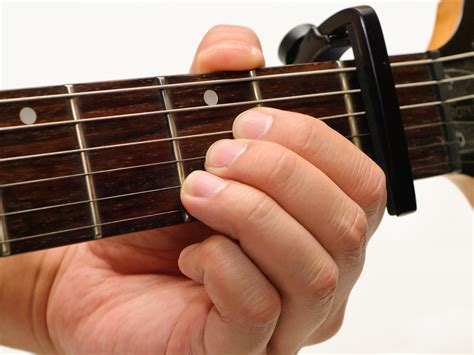 Divided into two sections, with and without capo. How to Use a Guitar Capo: 5 Steps (with Pictures) - wikiHow