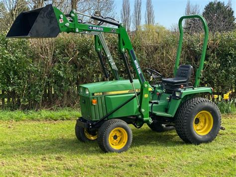 John Deere 855 4wd Compact Tractor Fitted With Loader On Wide Turf