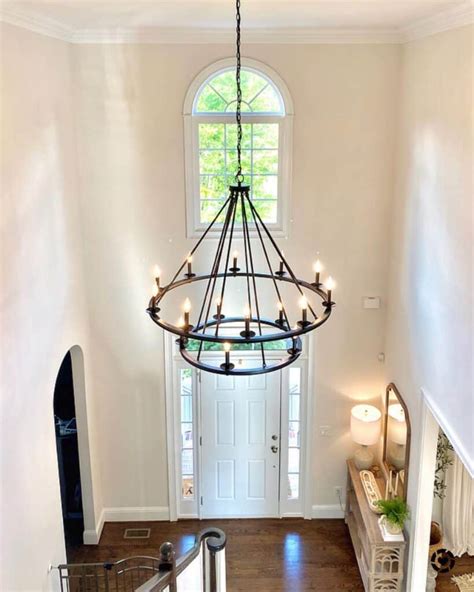 Foyer With Two Tier Black Wagon Wheel Chandelier Soul And Lane