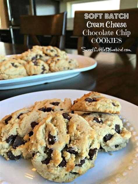 Soft Batch Cream Cheese Chocolate Chip Cookies On A White Plate Next To