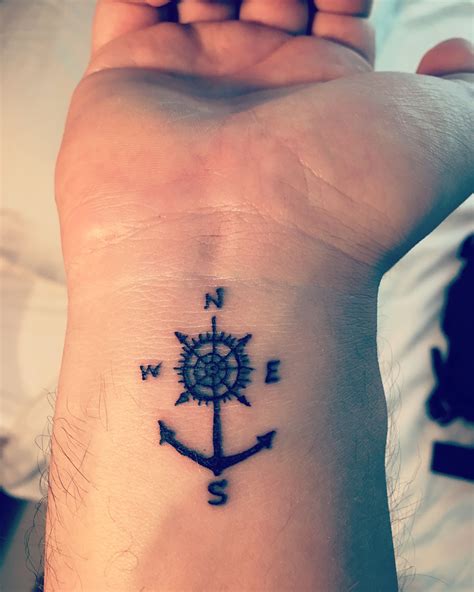 Forearm Anchor And Compass Tattoo Designs