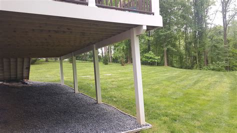 A Gravel Under Deck Design Helps To Stop Erosion As Well As Adding