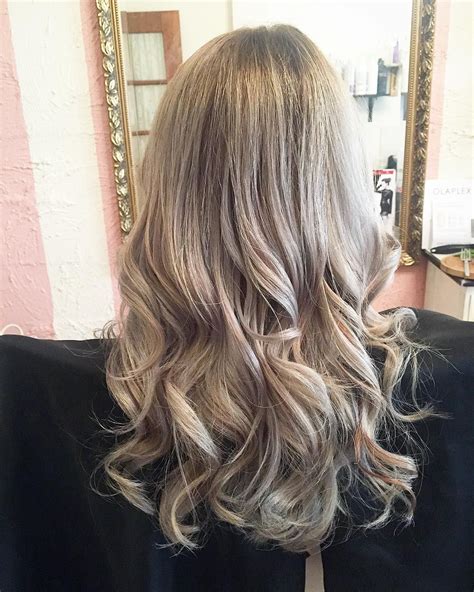 The combo of dark and light undertones makes it a style you'll def want to try out. Icy Blonde with Dark Roots | Dark roots hair, Ashy blonde ...