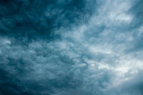 Dark Blue Ominous Storm Clouds Close Up Overhead Dramatic Sky