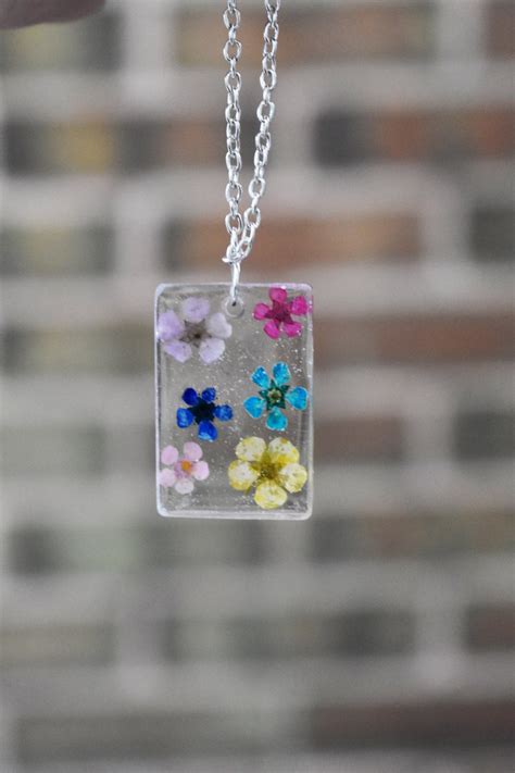 Pink sage bundle with dried flowers and a rhodonite point or rose quartz crystal Clear Resin Dried Flower Pendant Short Colorful Silver ...