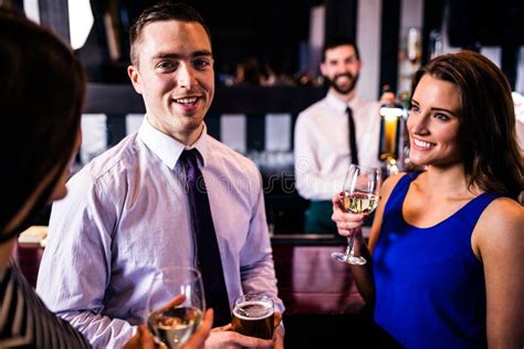 Friends Talking And Having A Drink Stock Image Image Of Lager