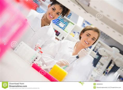 Pretty Science Students Using Pipette Stock Photo Image Of Medicine