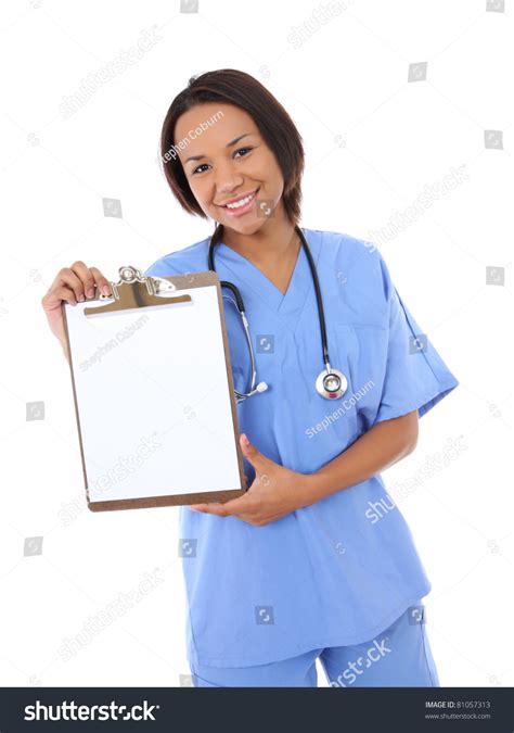Pretty African American Nurse Holding Clipboard Stock Photo 81057313