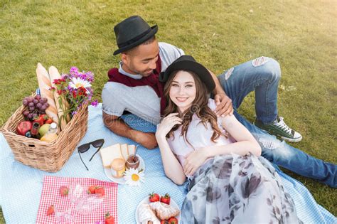 Couple Lying And Having Picnic On Lawn Stock Image Image Of Couple African 98738523