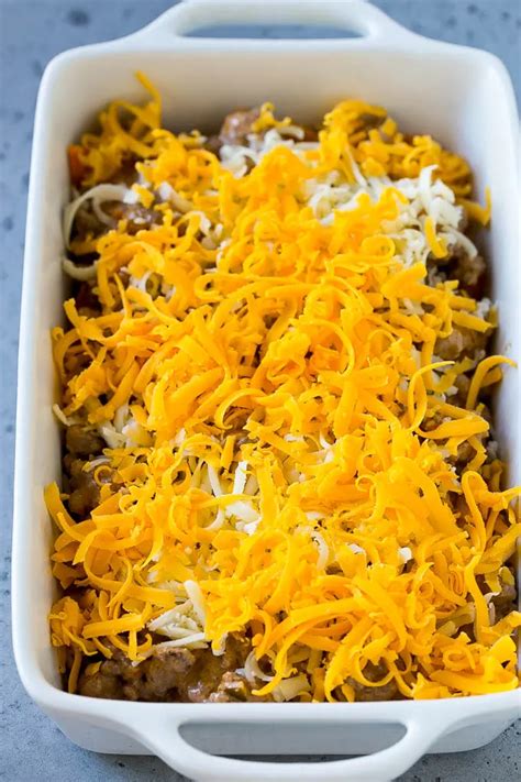 In a 9x13 casserole dish, start with a layer of doritos. Dorito Casserole Recipe | Mexican Casserole | Beef ...