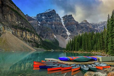 Moraine Lake Colorful Canoes Photograph By Dan Sproul