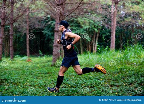 A Man Runner Of Trail And Athlete S Feet Wearing Sports Shoes For Trail