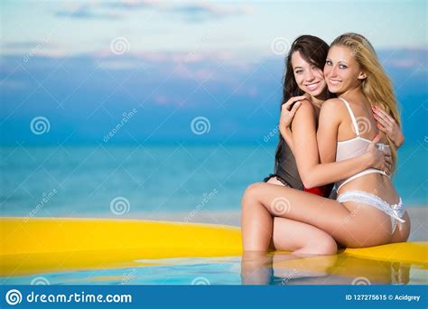Two Playful Women Hugging Each Other Stock Image Image Of Lady Outdoor 127275615