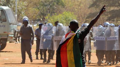 protesters and police clash in zimbabwe the new york times