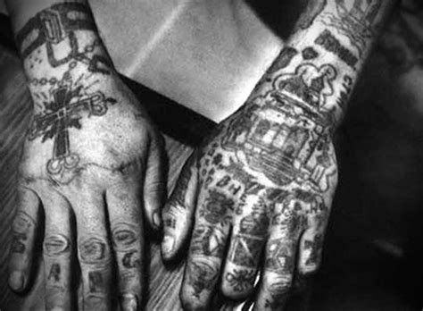 Фото тюремных наколок на пальцах узнай все о мире татуировок в тюрьме