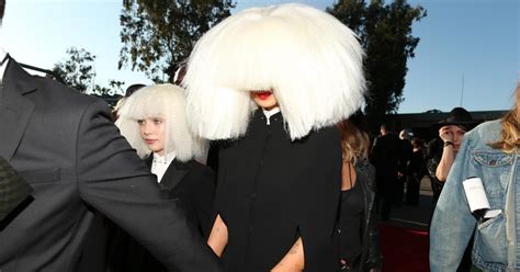 Why Does Sia Cover Her Face Heres The Scoop