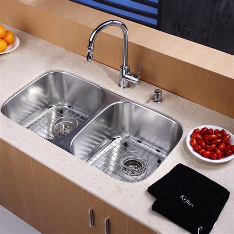 Looking for the best undermount kitchen sink? Kraus KBU22KPF1622KSD30CH 32 Inch Undermount 50/50 Double ...