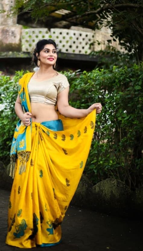Indian Model Latest Hot Pics In Yellow Saree Navel Queens