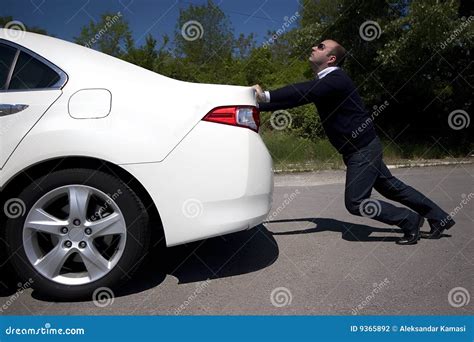 Businessman Pushing A Car Stock Photography Image 9365892