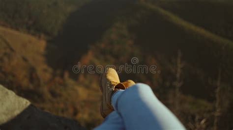 Close Up Hiking Boots Of Independent Woman Traveller On Top Of Mountain