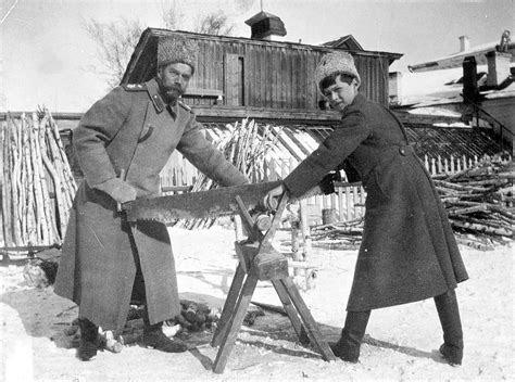 Tsarevich Alexei Nikolaevich And Tsar Nicholas Ii Sawing Wood At