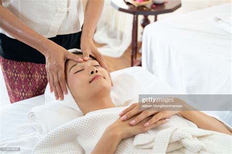 Calm Girl Having Spa Facial Massage In Luxurious Beauty Salon High Res
