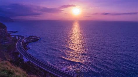 Sunset paintings have always been a good choice for wallpapers. Purple Sunset Reflection 4K Wallpapers | HD Wallpapers ...