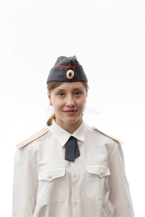 A Beautiful Young Female Russian Police Officer In Dress Uniform In A