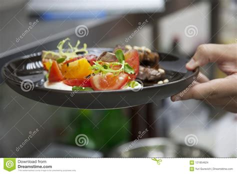 Hands Cook Cooking Lamb With Vegetable Garnish Stock Photo Image Of
