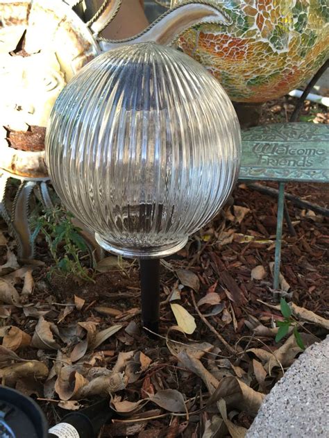 Light Fixture Glass Globe Repurpose Into A Solar Powered Night Time Globe Solar Lights Garden