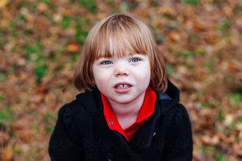 Cute Little Girl Outside In Fall By Holly Clark Stocksy