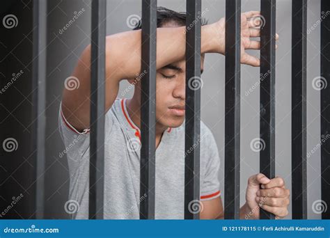 Man In Jail Behind Bars Stock Image Image Of Cell Dark 121178115