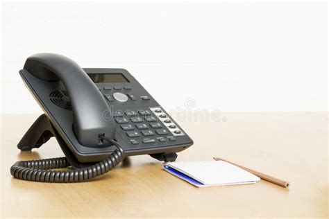 Phone On Desk With Notepad On Wooden Desk Stock Image Image Of