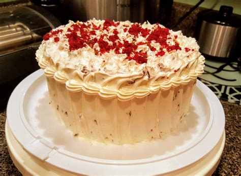 This scrumptious red velvet cake is filled with a cooked frosting, which is not as sweet as many frostings. Red Velvet Cake with cream cheese icing and chopped pecans ...