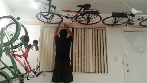 Revamping your garage space doesn't have to be costly. Cheap and easy DIY flat-to-ceiling storage | Bike storage ...