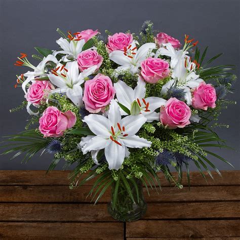 White Lily And Pink Rose Bouquet An Exquisite Display Of White Oriental