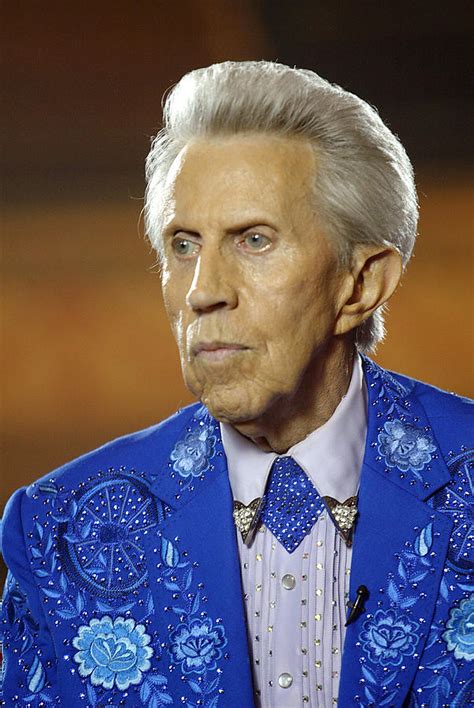 A person who carries burdens especially : How Tall is Porter Wagoner? (2020) - How Tall is Man?