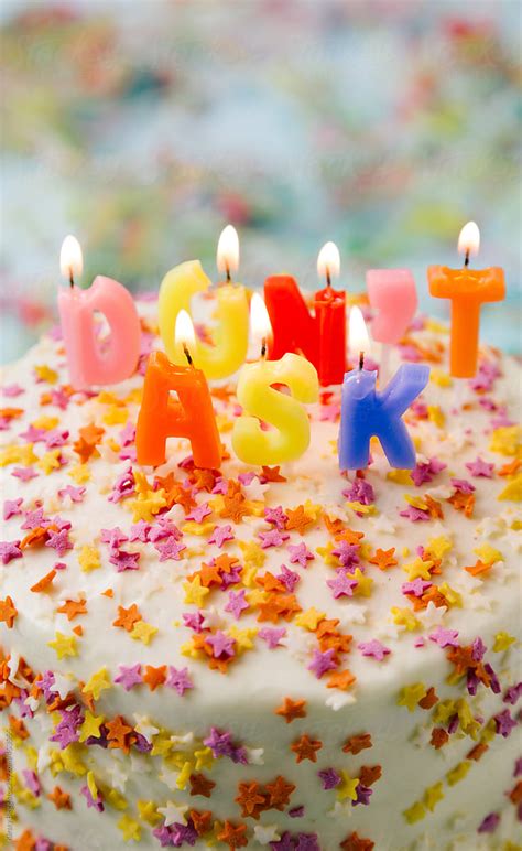 Birthday Cake With Dont Ask Letters In Candles By Stocksy
