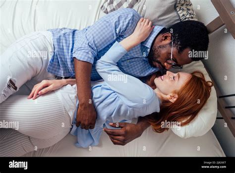 Redhaired Ginger Caucasian Happy Female And Multi Ethnic Afro Man