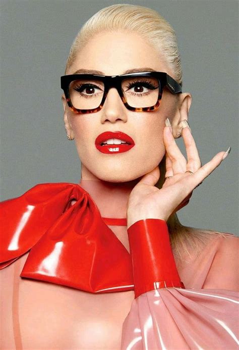 Gwen Stefani Touching Her Face With Red Fashion Outfit And Thick Tortoise Eyeglasses Blonde Guys