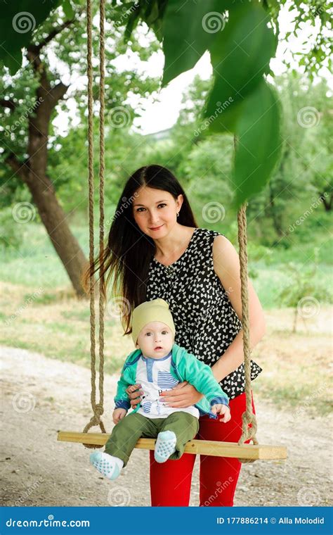 Mom With Baby Boy In The Park Stock Photo Image Of Beautiful Young