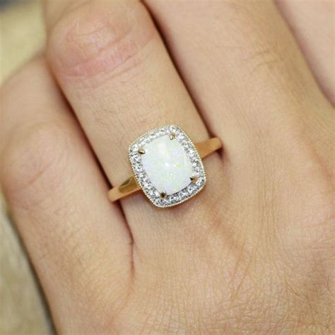 Instead of the four cs (cut, color, clarity and carat weight), the. 100 Engagement Rings Under $1000 | Engagement rings opal, Gold opal engagement ring, October ...