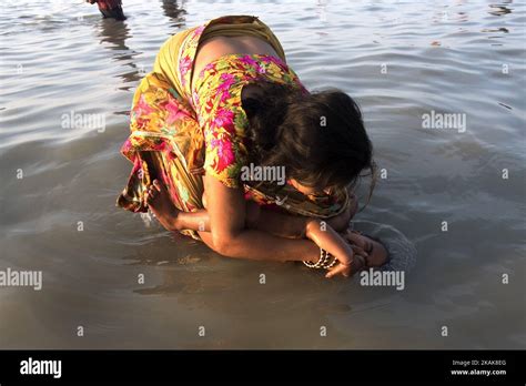 Hindu Devotees Take A Holy Bath And Perform Rituals At The Gangasagar
