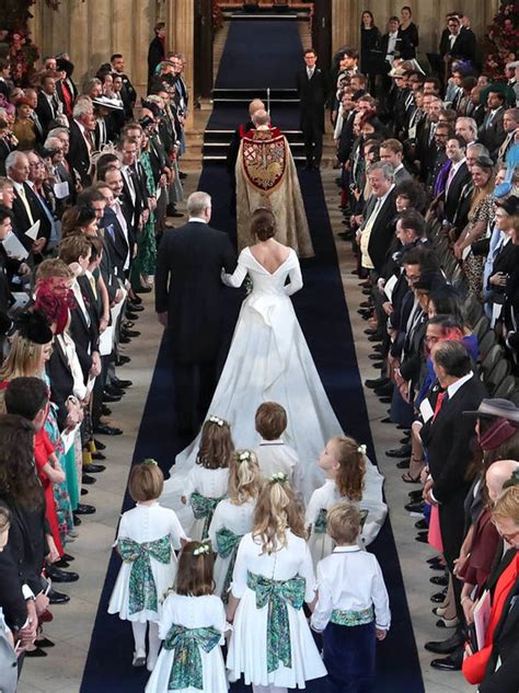 Princess eugenie of york arrives at st george's chapel for her wedding to jack brooksbank in windsor castle on october 12, 2018 in windsor. Princess Eugenie wedding dress: First pictures of the ...